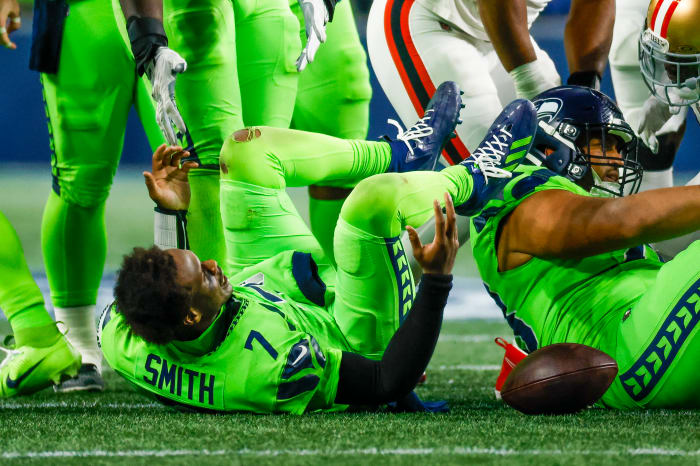 Seattle Seahawks quarterback Geno Smith (7) reacts following a sack by the San Francisco 49ers during the fourth quarter at Lumen Field.
